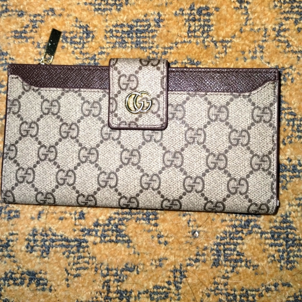 Wallet with GG all over it